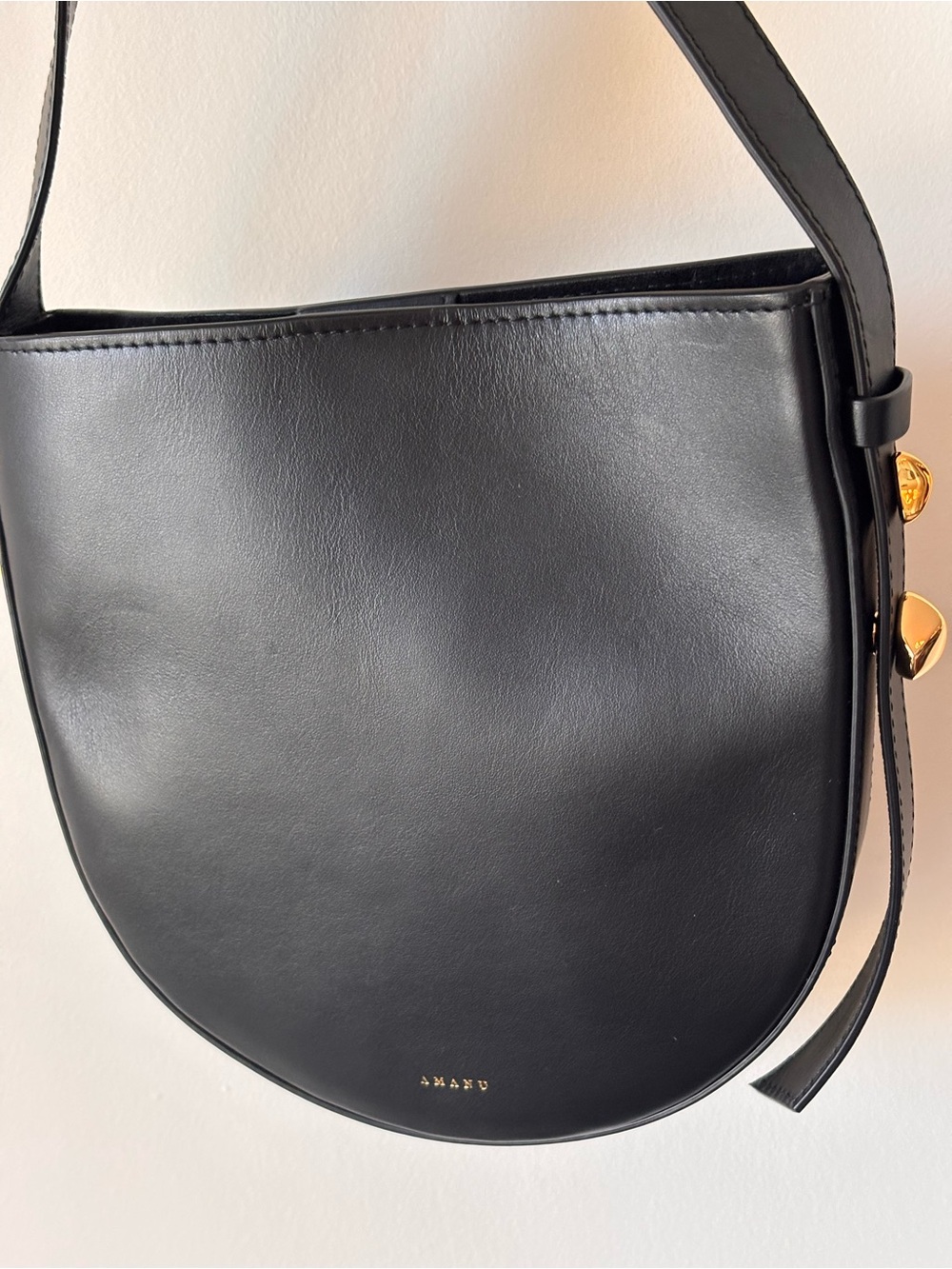 Black Half-Moon Leather Crossbody Bag with Gold Accents - Picture 3 of 6
